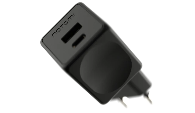 Kompaktowa czarna ładowarka sieciowa Notomi 20 W z portami USB-A i USB-C.